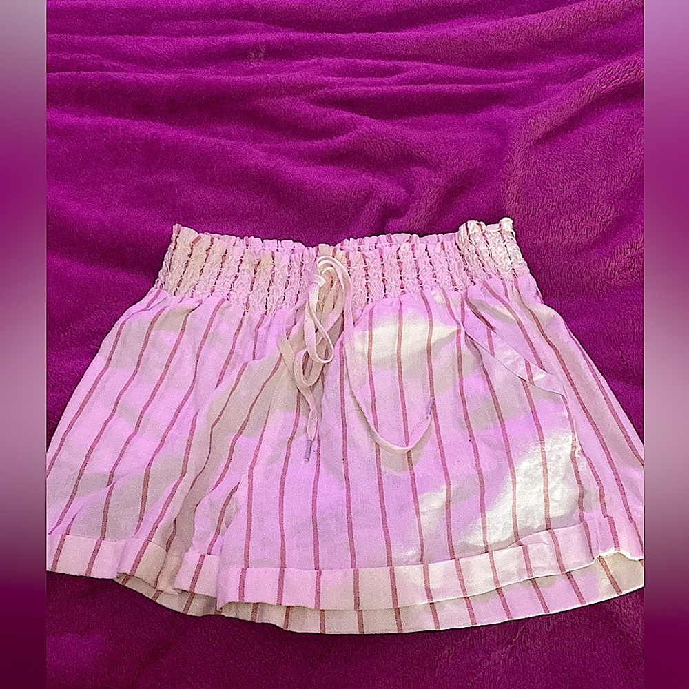 New shorts with tags: size small with strips very cute never worn!!